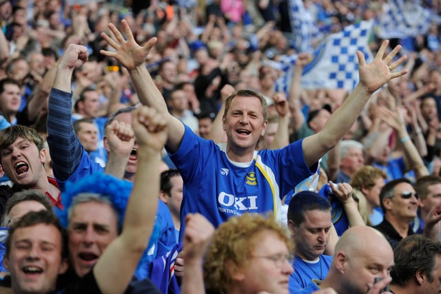 Pompey fans toast the victory over Spurs.