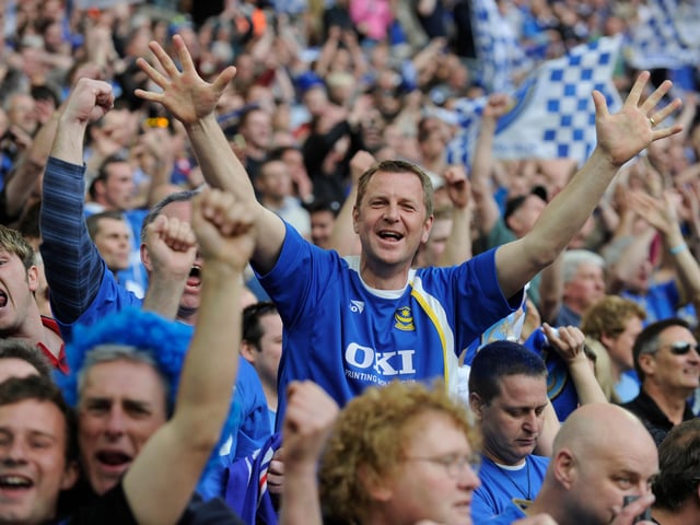Pompey fans toast the victory over Spurs.