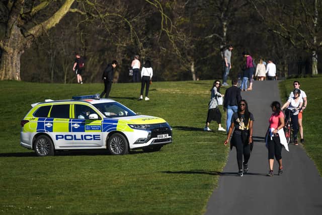 A police car is seen patrolling  (Photo by Peter Summers/Getty Images)