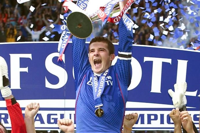 Lifted the SPL trophy for the first time as Rangers captain in 2003 and it would not be the last.