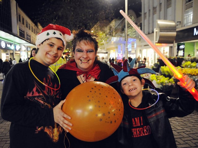 Mark Smith (12), Caroline Smith (41) and Benjamin Smith (seven) celebrating the Christmas lights switch-on in Commercial Road, Portsmouth in 2008
Festive switch-on of the City Centre Christmas Lights in Commercial Road, outside Debenhams near the Jubilee Fountain and inside the Cascades Shopping Centre. 
Picture: Michael Scaddan (084638-0048)