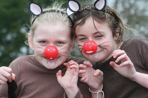Mollie Edge and Sophie Spencer dress as the Red Nose Rats at Bakewell Methodist Junior School in 2009.