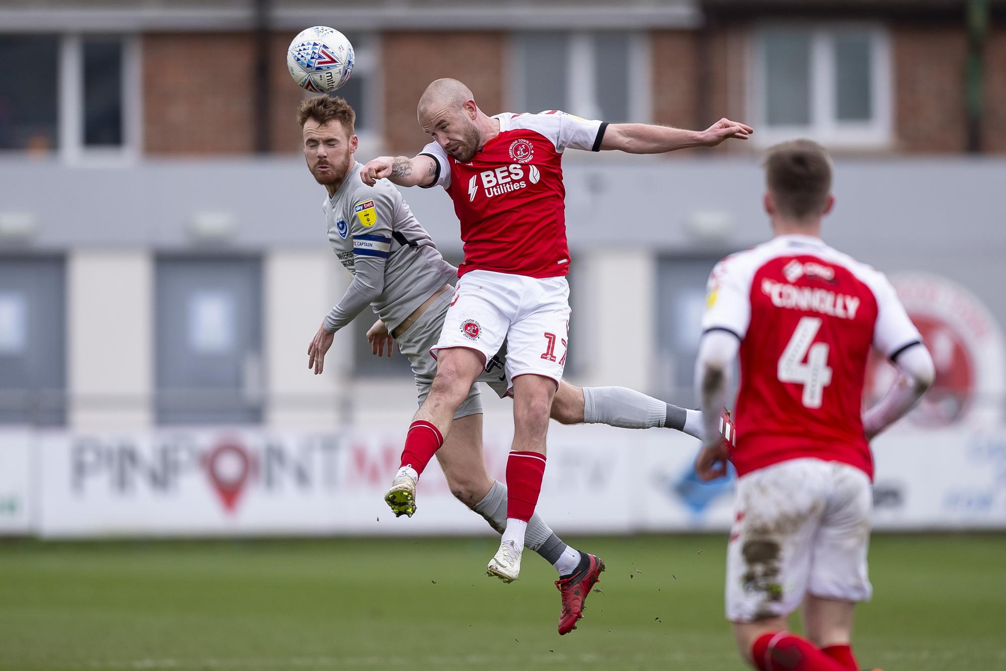 Tom Naylor wins a header