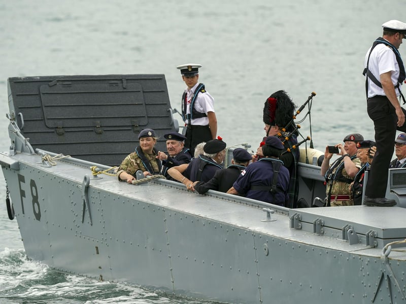 D-Day veterans are welcomed to the Portsmouth Historic Dockyard to commemorate the 77th anniversary of the Normandy Landings. Picture date: Sunday June 6, 2021. PA Photo. Picture: Steve Parsons/PA Wire