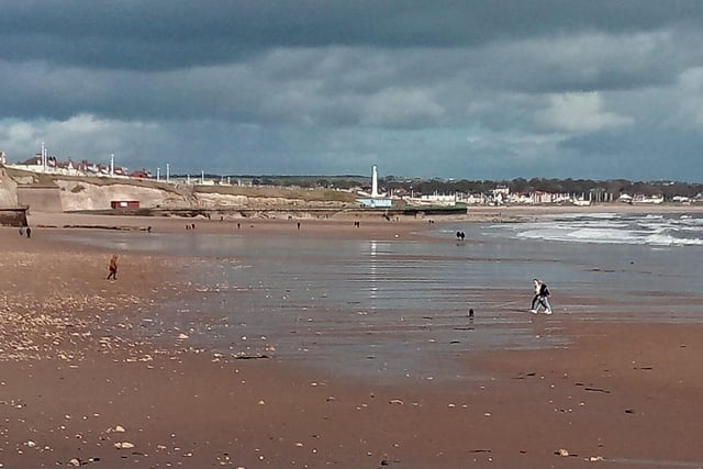 Several people can be seen at Roker Rocks but no recreational or leisure activity is permitted.