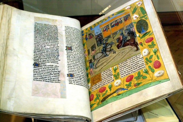 A manuscript dating from the late 15th century at the Quest for Camelot exhibition in 2001.
