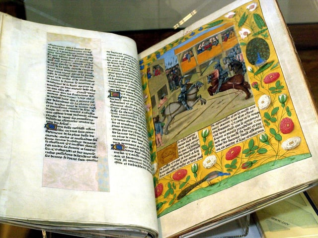 A manuscript dating from the late 15th century at the Quest for Camelot exhibition in 2001.