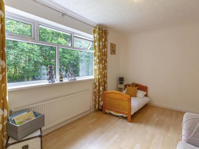 This fourth bedroom is currently being used as a child's room. But it is versatile and flexible.