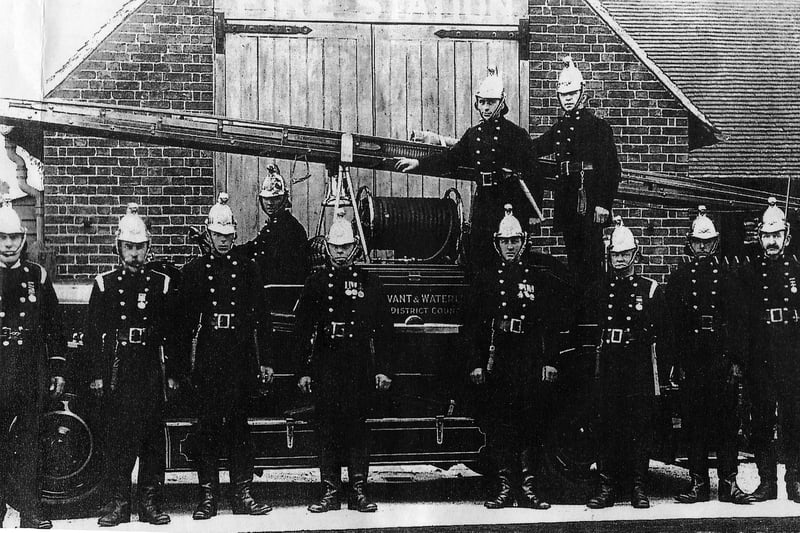Havant firemen outside their old station resplendent in their brass helmets