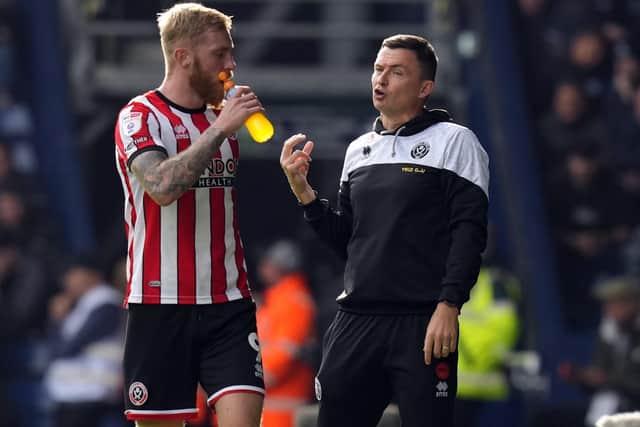 Sheffield United manager Paul Heckingbottom with centre-forward and former Swansea City man Oli McBurnie: Andrew Yates / Sportimage