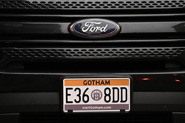 Gotham branding for the vehicle licence plates.