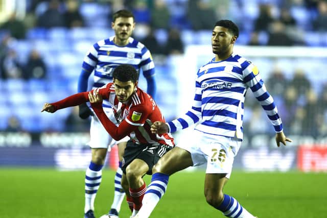 Morgan Gibbs-White of Sheffield United tackles Josh Laurent of Reading during the Sky Bet Championship match at the Select Car Leasing Stadium: David Klein / Sportimage