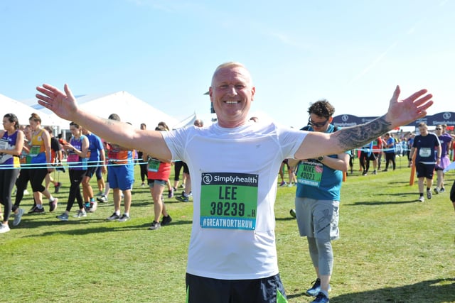 Lee poses for a picture at the Great North Run finish line - and he doesn't even look tired!