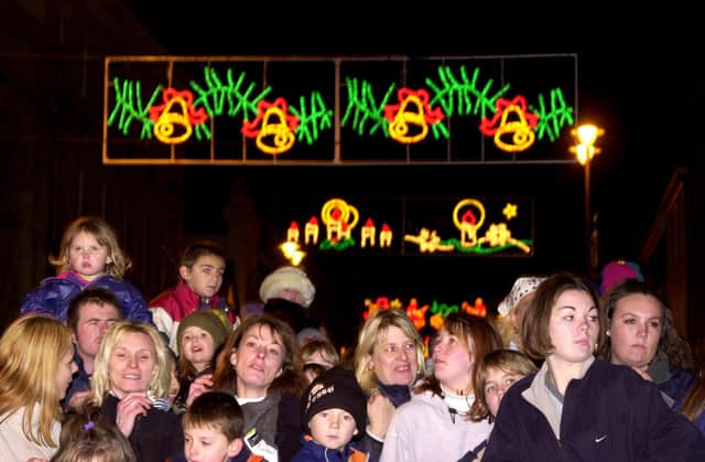 Who can you spot watching the light being switched on in these pictures which go back to the late 90s?
