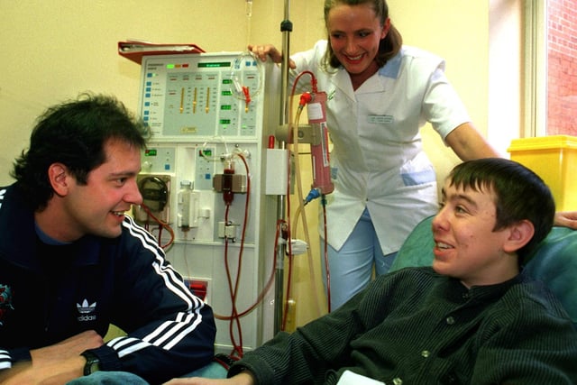 Sheffield Steelers player Ron Shudra meets up with dialysis patient Paul Sandford from Deepcar and staff nurse Jackie Cousin during his visit to the Sheffield Kidney Unit at the Northern General Hospital