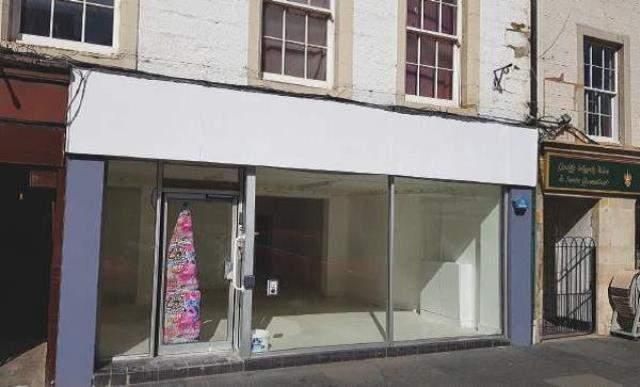Well-presented shop premises contained on the ground floor of a three storey mid terrace building in a prime retail location - Non quoting.
