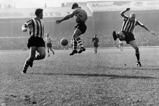 Action from the Sheffield derby at Bramall Lane in 1962.