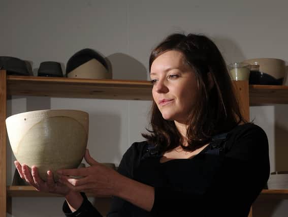 Francesca Hague, of Grey Suit Clay, with an item from her range of ceramic homeware. Picture: Andrew Roe.