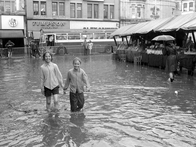 Mansfield market was still in full swing despite the floods.
Do you recognise either of these two smiling faces?