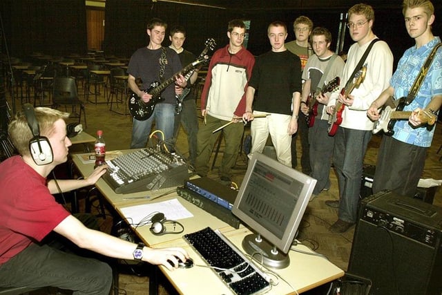 Pupils from High Storrs School pictured recording their own CD with producer Mark Neal (left), February 6, 2002