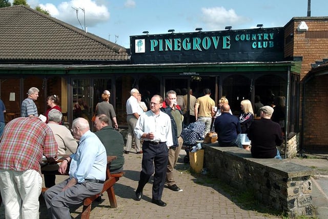Enjoying an auction at the Pinegrove Country Club, Stannington, Sheffield, July 2004