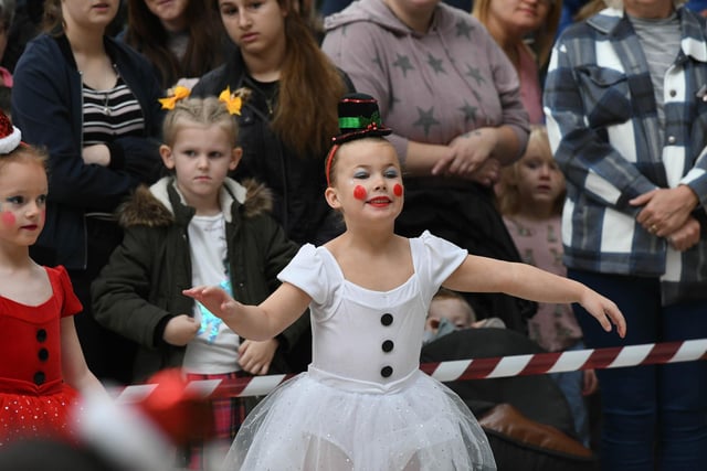 Young dancers from VA Preforming Arts entertaining the crowd befote the arrival of Santa Claus.