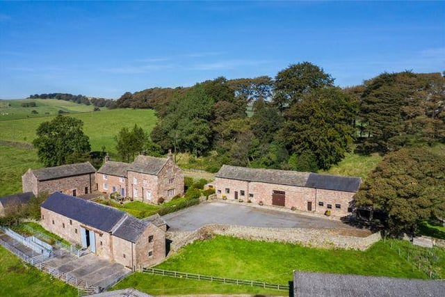 This five bedroom farmhouse has Grade II listed barns which offer tremendous potential. Marketed by Savills, 01625 684627.