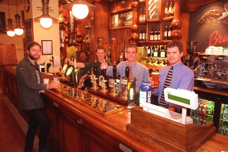Hallamshire Hotel, West Street, Sheffield. Seen are staff LtoR  Pamela Mitchel Bar Maid, Darren Rosdale Barman, Peter Findlay Assiostant Manager, and Andrew Parkinson the Land Lord. The Customer is Richard Hough  of Camra in 1998