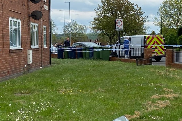 Forensics teams could be seen in the street again today as investigations continue.