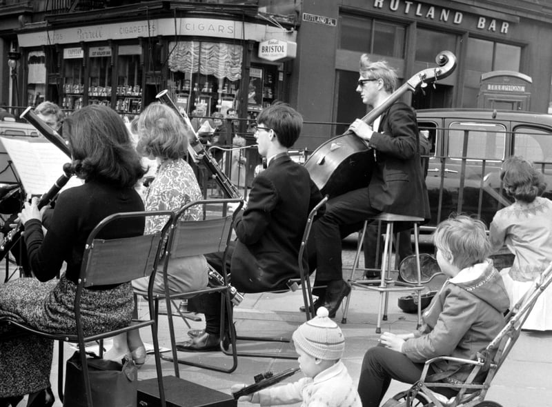 During the University of Edinburgh's Students Charities Day in April 1966, the University Musical Society played chamber music at the west end of Princes Street to raise some cash from shoppers.