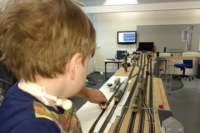 Jordan Reid is mad about trains, and now his grandfather Kevan Adams is hoping to build a new model railway set in the new portable workshop