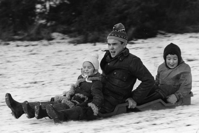 Perhaps you embraced the conditions and went out in the snow, like this family pictured sledging on the Cleadon Hills in January 1986.