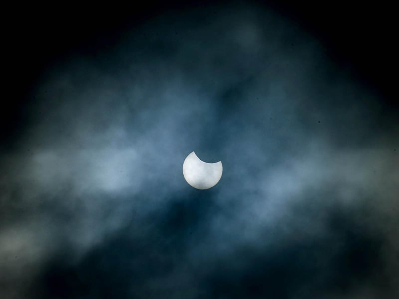 Lasting a couple of hours, the celestial event was easy to see when the skies cleared by anyone with solar eclipse glasses or even a kitchen colander.