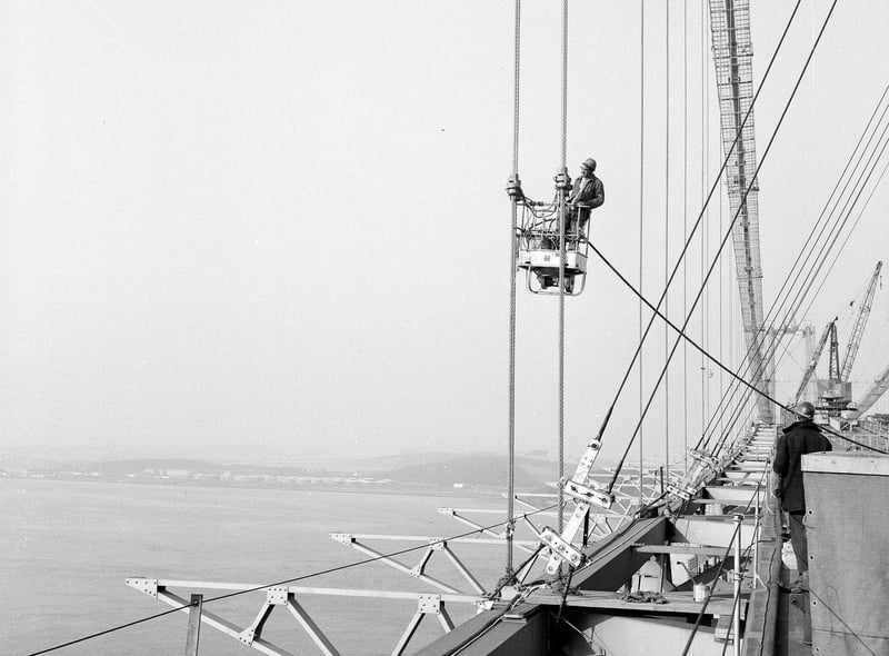Painting the main suspension steel ropes of the Forth Road Bridge in September 1963.