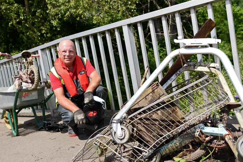 Patrick Sharkey, of At Litter Free, pictured with some of the items removed from the Bentley Mill Dike.