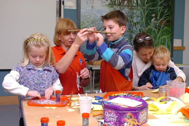 RSPB Saltholme held a Wintry Crafts session for youngsters in 2013. Pictured with session volunteer Anne Petty (second from left) are siblings Amelia Iddon, 5, and her brothers Sam, 7, and Henry, 2, along with their mam, Rachael.