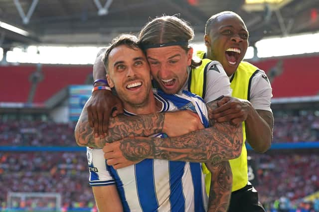 Sheffield Wednesday's Lee Gregory (left), Aden Flint and Dennis Adeniran celebrate their side's first goal of the game, scored by team-mate Josh Windass (not pictured) during the Sky Bet League One play-off final at Wembley Stadium, London. Picture date: Monday May 29, 2023. PA Photo. See PA story SOCCER Final. Photo credit should read: Nick Potts/PA Wire.

RESTRICTIONS: EDITORIAL USE ONLY No use with unauthorised audio, video, data, fixture lists, club/league logos or "live" services. Online in-match use limited to 120 images, no video emulation. No use in betting, games or single club/league/player publications.