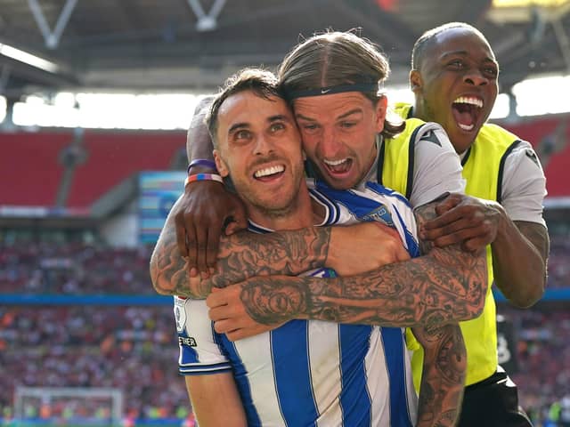Sheffield Wednesday's Lee Gregory (left), Aden Flint and Dennis Adeniran celebrate their side's first goal of the game, scored by team-mate Josh Windass (not pictured) during the Sky Bet League One play-off final at Wembley Stadium, London. Picture date: Monday May 29, 2023. PA Photo. See PA story SOCCER Final. Photo credit should read: Nick Potts/PA Wire.

RESTRICTIONS: EDITORIAL USE ONLY No use with unauthorised audio, video, data, fixture lists, club/league logos or "live" services. Online in-match use limited to 120 images, no video emulation. No use in betting, games or single club/league/player publications.