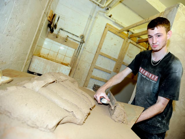 Doncaster Deaf School pupil James Thompson in the Plastering Class back in 2012