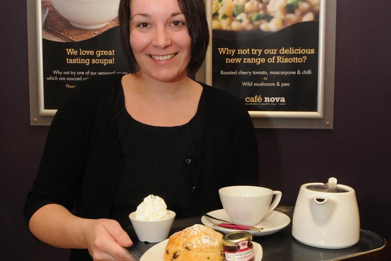 A staff member serves up a treat at Café Nova in Mansfield in 2012.
