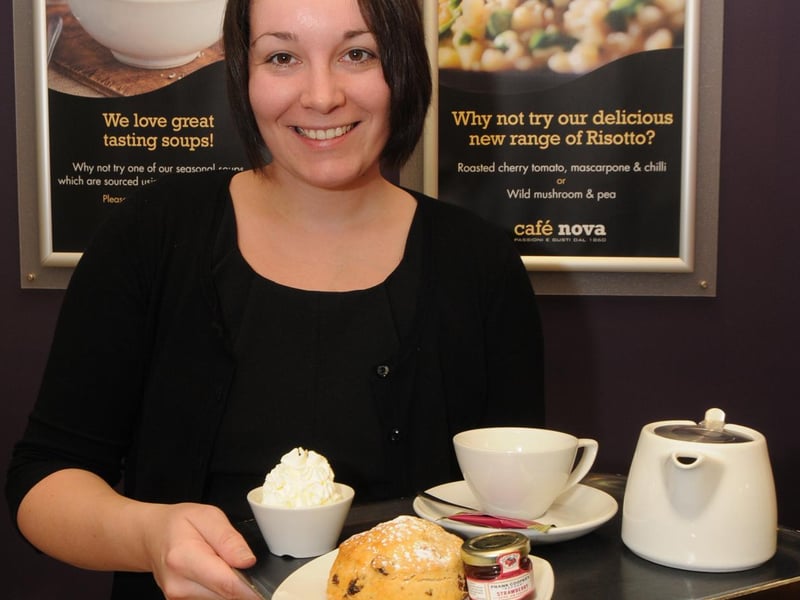 A staff member serves up a treat at Café Nova in Mansfield in 2012.