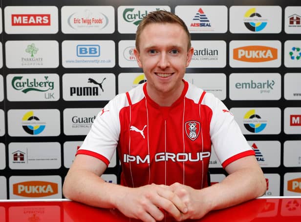 Shane Ferguson has joined Rotherham United on a two-year deal following his release from Millwall