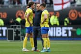 Neal Ardley consoles Callum Howe and Sheffield United loanee Harry Boyes of Solihull Moors after their side's defeat during the Vanarama National League Final match against Grimsby Town at London Stadium (Steve Bardens/Getty Images)