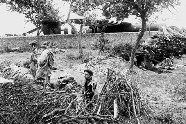 Airborn troops dig in alongside their Airspeed Horsa gliders close to where they landed at midnight 6/6/1944, prior to the attack to capture the soon to be famous Pegasus bridge over the Caen canal.  
IWM pic B5051
