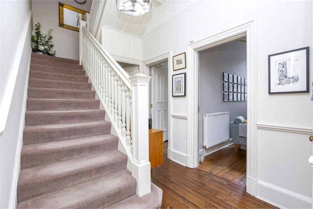 Who doesn't love a sweeping staircase into a grand hall way?
