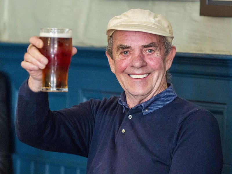 A customer enjoys his pint at the Scotsman's Lounge, Cockburn Street, Edinburgh.
