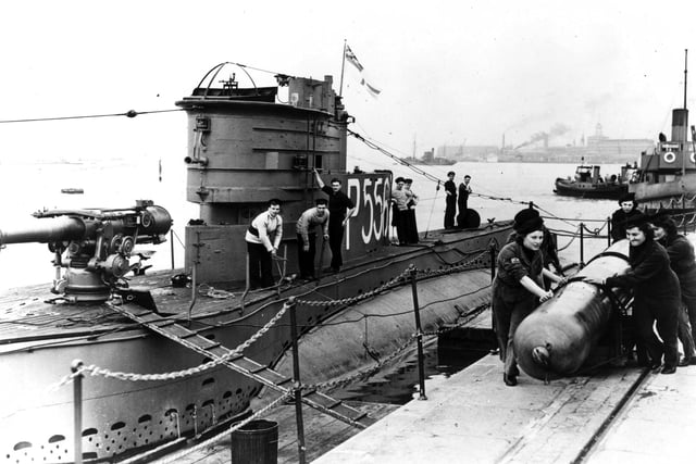 Wrens loading torpedoes at HMS Dolphin in World War II