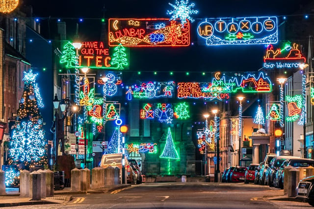 This year, because of coronavirus restrictions, the Christmas lights were turned on in a reduced event, with minimal participants.