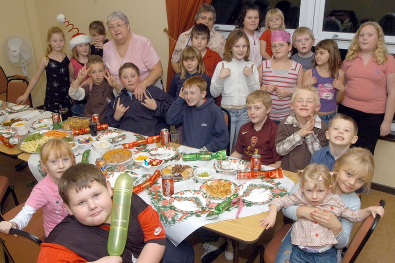 Sutton Helpers and youngsters pictured at the final Christmas Party held by the Willetts Court Residents Association Youth Group.