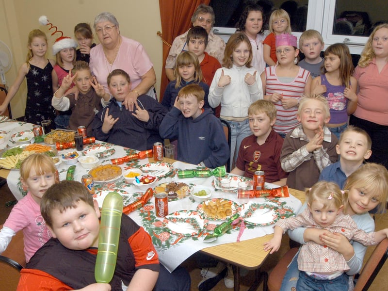 Sutton Helpers and youngsters pictured at the final Christmas Party held by the Willetts Court Residents Association Youth Group.